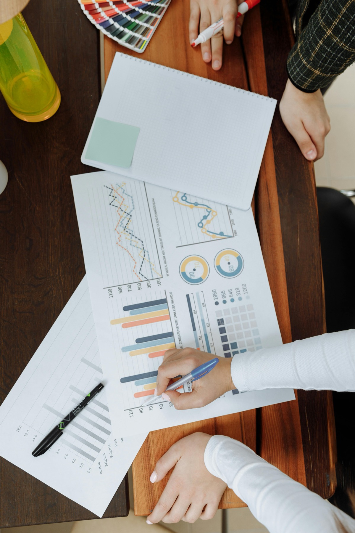 Team working over charts and data